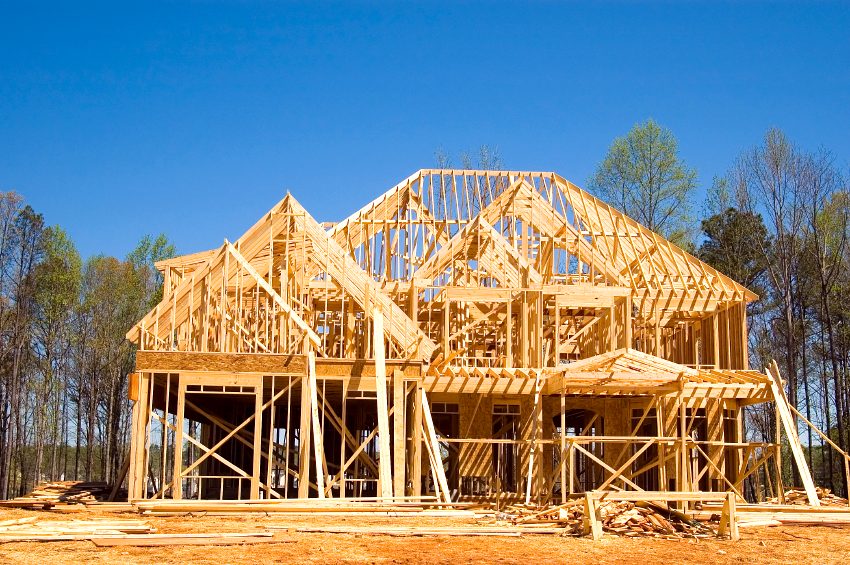 Two-storey custom home framed by APD Carpentry with multiple roof gables